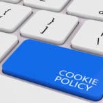 Blue Cookie Policy Key on White PC Keyboard extreme closeup. 3d Rendering