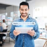 Businessman, tablet or search engine hologram for information, 3D or SEO graphic for iot research. Smile, happy and creative Asian person on digital technology for internet browsing overlay in office